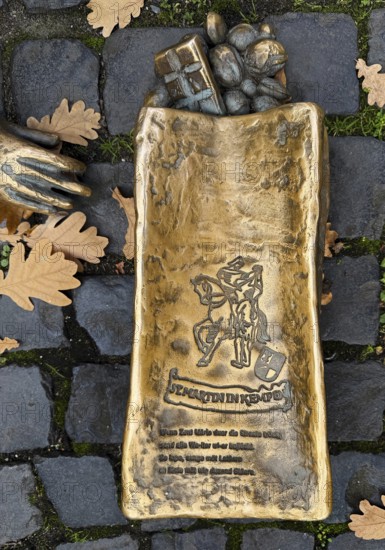 Martin bag of the sculpture entitled Saint Martin in Kempen by Michael Franke am Buttermarkt, detail, Lower Rhine, North Rhine-Westphalia, Germany