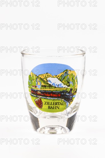Schnapps glass with decorative Zillertal railway motif, colorful mountains and railroad