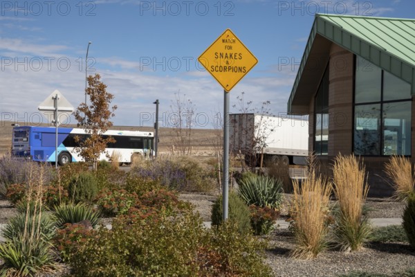Aragonite, Utah - A sign urges travelers to beware of snakes and scorpions at a rest area along Interstate 80 in the Utah desert