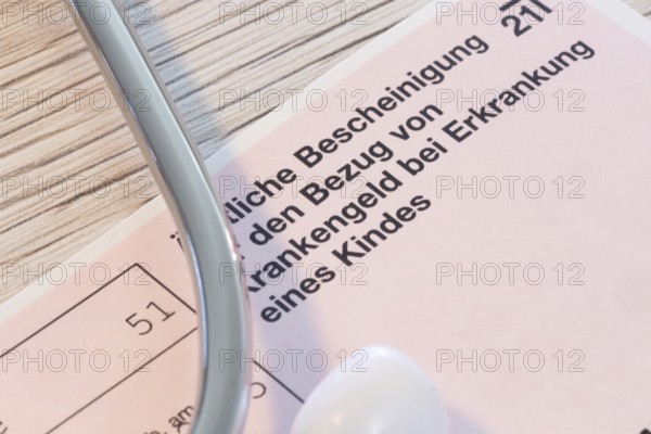 Close-up of a medical certificate for receiving sickness benefit if the child is ill