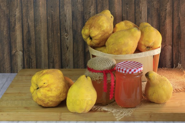 Picturesque still life with quinces and homemade quince jelly, autumn, Germany