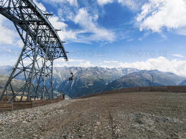 Scenic view from the mountain station of the Gaislachkogel cable car on the Gaislachkogel in the Ötztal Alps down to the Ötztal and to Sölden, Tyrol, Austria