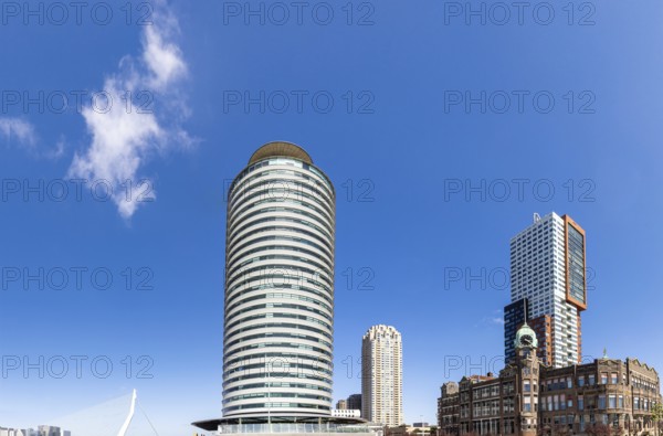 Panoramic view of Rotterdam Old Port and river promenade waterfront areas of Wilhelminakade and Kop van Zuid. Financial business district skyline
