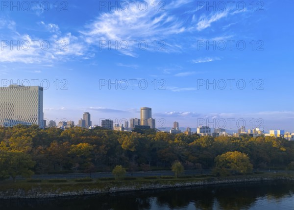 Japan, panoramic view of Osaka skyline at sunset