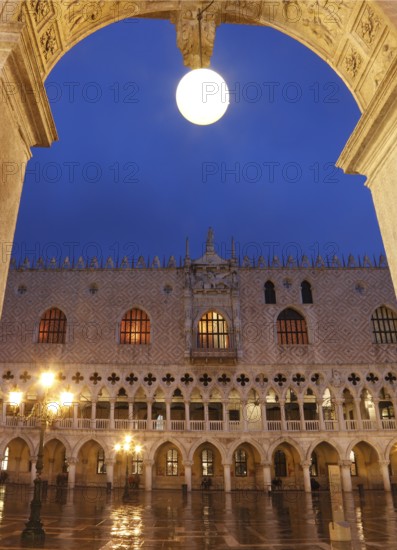 West façade of the Doge's Palace on the Piazzetta in the evening in rain, Venice, Veneto, Italy