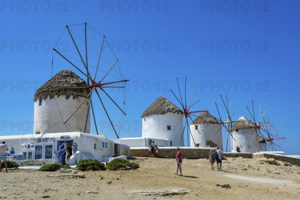 Mykonos, Cyclades, Greece - The six sixteenth-century windmills, lined up on a hill above Mykonos Town, Mykonos Chora, are the island's landmark. Mykonos is part of the Cyclades archipelago in the Aegean Sea