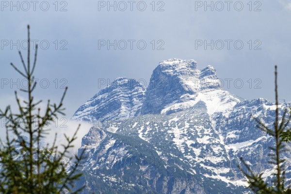 View into the mountains next to Lake Almsee on a rainy day in spring, Traunstein summit, Traunkirchen, Salzkammergut, Austria