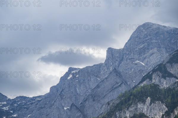 View into the mountains next to Lake Traunsee on a rainy day in spring, Traunstein summit, Traunkirchen, Salzkammergut, Austria