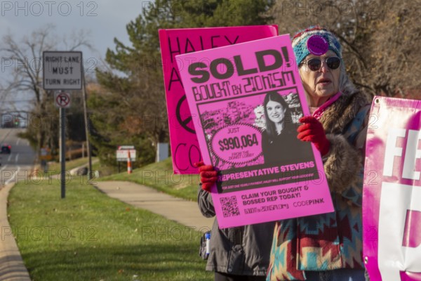 Farmington Hills, Michigan USA - 10 November 2025 - Activists picket U.S. Senator Haley Stevens' suburban Detroit office to protest the senator's acceptance of campaign funding from the American Israel Public Affairs Committee (AIPAC). CodePink is a feminist anti-war organization