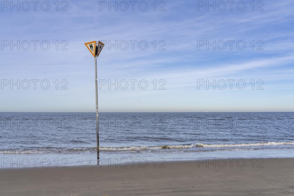 East Frisian North Sea island of Spiekeroog, Wadden Sea National Park, in winter, SOS, emergency call sign, east beach, beach section
