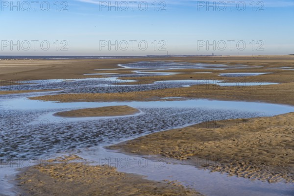 East beach of the East Frisian island of Spiekeroog, at low tide, tidal creek, watercourse at low tide, looking east towards the island of Wangerooge, Lower Saxony, Germany