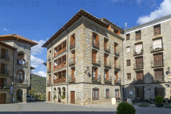 Buildings in main square plaza of historic medieval village of Boltana, Huesca province, Aragon, Spain