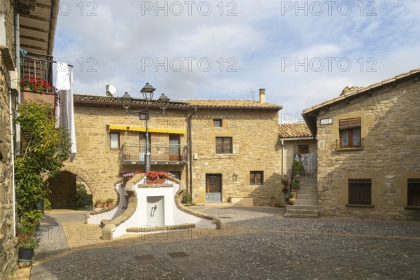 Plaza medieval buildings village of Isuerre, Val d'Onsella, Zaragoza province, Aragon, Spain