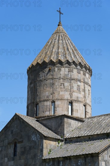Detailed church tower with cross on top against a clear sky, main church Surb Pogos-Petros, Tatev monastery, Armenian Apostolic monastery, Syunik province, Caucasus, Armenia