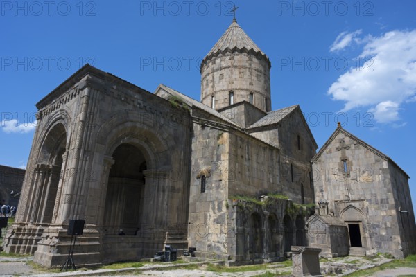 Historic stone church under blue sky, impressive architecture, Surb Pogos-Petros main church, Tatev monastery, Armenian Apostolic monastery, Syunik province, Caucasus, Armenia