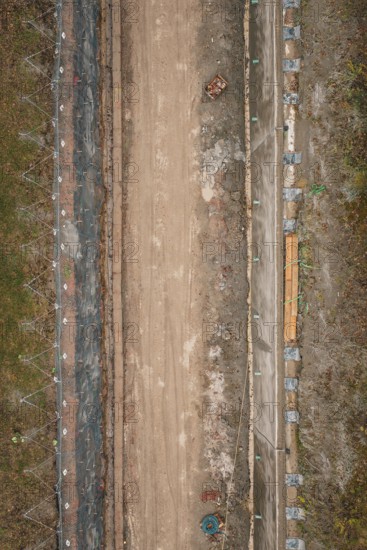 Vertical view of a construction site with earthworks and building materials along the route, construction of the Hermann Hesse Railway, Im Hau, Calw, Germany