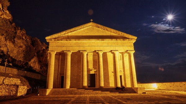 Historic temple at night with lighting and full moon in the sky, UNESCO World Heritage Site, Old Town of Corfu, Corfu, Kerkyra, Ionian Islands, Greece