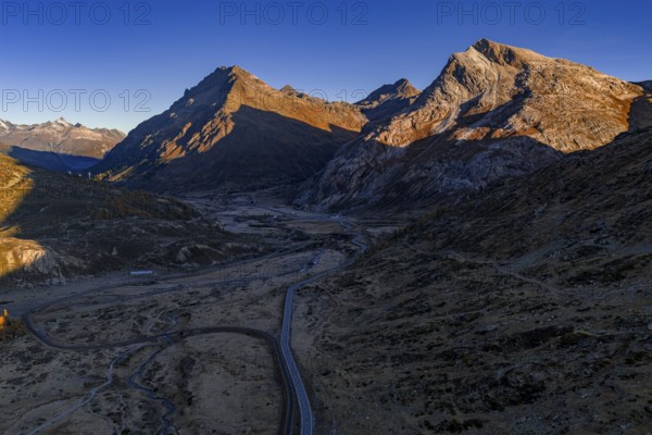 Mountain landscape, autumn, morning light, aerial view, road, Bernina Pass, Engadin, Switzerland