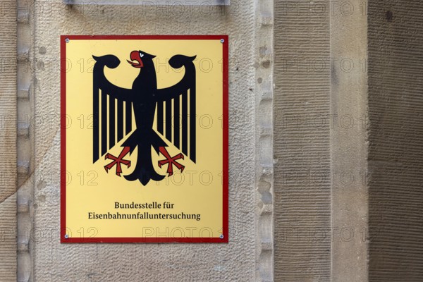 Sign from the Federal Office for Iron Accident Investigation with the National Emblem of the Federal Republic of Germany. The authority is investigating rail accidents. Stuttgart, Baden-Württemberg, Germany