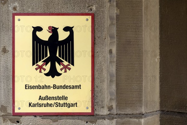 Federal Railway Authority sign. Federal Railway Authority (EBA) building with the national emblem of the Federal Republic of Germany. Stuttgart, Baden-Württemberg, Germany