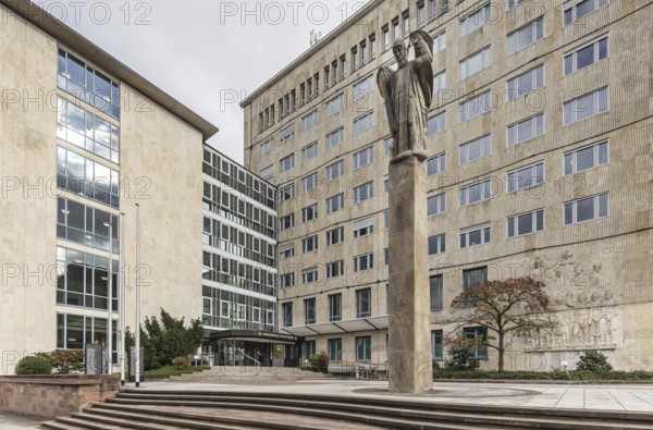 Stuttgart Regional Court. Court building with sculpture Constitutional Column and memorial for victims of justice under National Socialism. Stuttgart, Baden-Württemberg, Germany