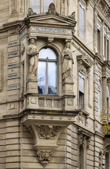 Art Nouveau façade with bay window and figures in Olgastraße. Stuttgart, Baden-Württemberg, Germany