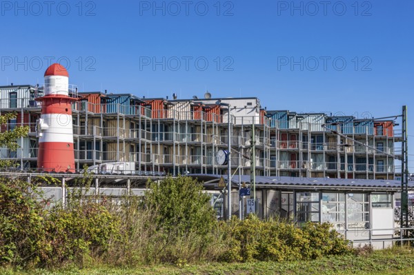 Hotel Dock Inn Hostel made of former containers and the S-Bahn stop in Warnemünde, Mecklenburg-Western Pomerania, Germany