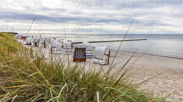 Beach with beach chairs on Schwarzen bush on the island of Poel on the Baltic Sea, Mecklenburg-Western Pomerania, Germany