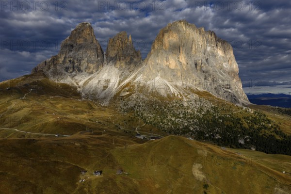 Mountain landscape, steep mountains, morning light, cloud atmosphere, autumn, Sella Pass, view of Lungkofel and Plattkofel, Dolomites, Italy