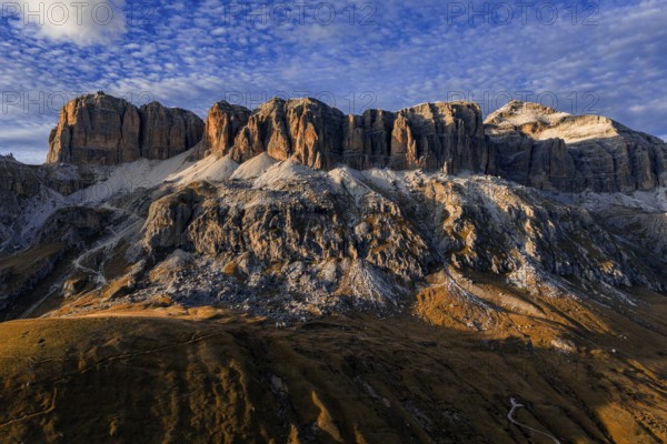 Mountain range, mountain landscape, sunny, clouds, evening light, autumn, aerial view, Pordoi Pass, view of Piz Bö, Sella Group, Dolomites, Italy