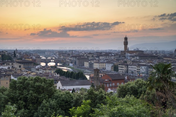 View from Piazzale Michelangelo, city view at dusk, Ponte Vecchio, Palazzo Vecchio and River Arno, Florence, Tuscany, Italy