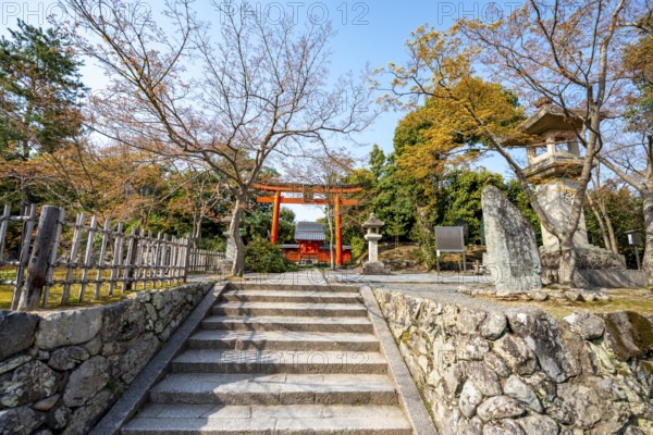 Entrance with red torii, Shogan-ji Buddhist temple complex, Sagatenryuji Susukinobabacho, Kyoto, Japan