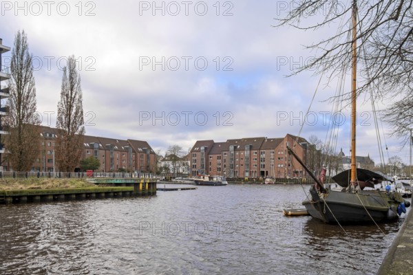 Boats in harbour, Mühlenhunte river, Oldenburg, Lower Saxony, Germany