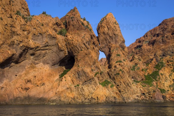 Rock formations and deep blue water in Scandola Nature Reserve, Corsica