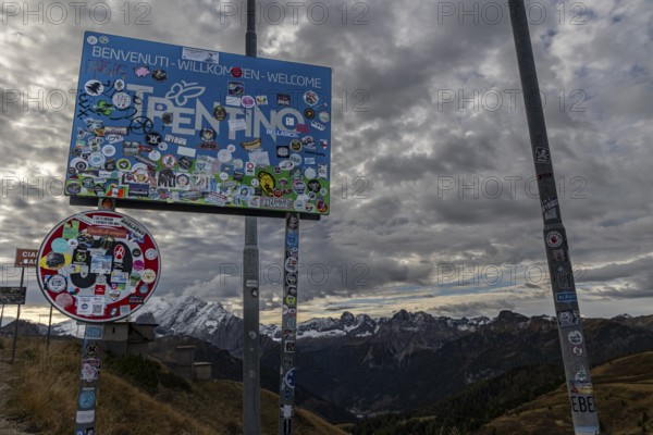 Sign, road sign, sticker, soccer fans, Sella Pass, Dolomites, Italy