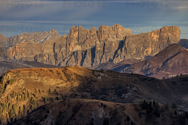 Steep mountains, mountain range, evening light, cloudy, autumn, Pordoi Pass, view of Croda da Lago, Dolomites, Italy
