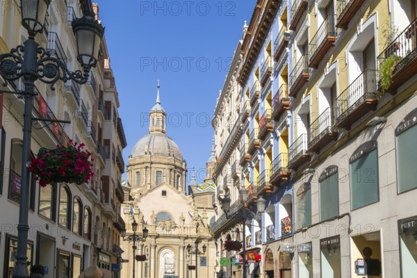 View of Basilica of Our Lady of the Pillar cathedral church from Calle de Alfonso I, Zaragoza, Aragon, Spain