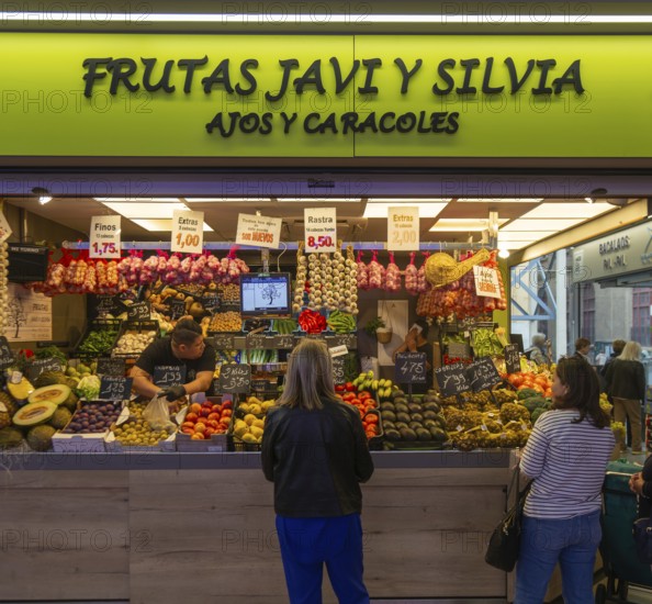 Market stall shop store selling fruit and vegetables inside Mercado Central de Zaragoza, Zaragoza, Aragon, Spain