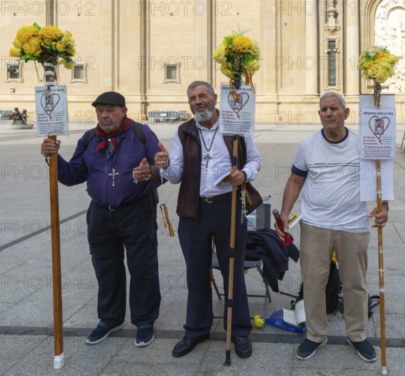 Men saying rosary prayers for human life, Rosario Por La Vida, Zaragoza, Aragon, Spain