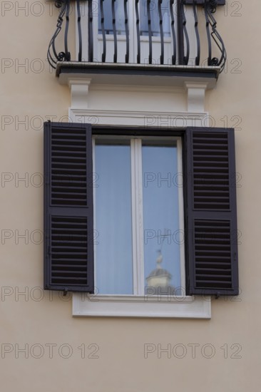 Window of a building in the city of Rome, Italy