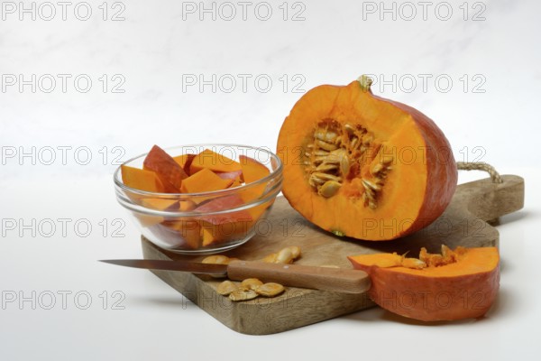 Hokkaido pumpkin, sliced with a knife