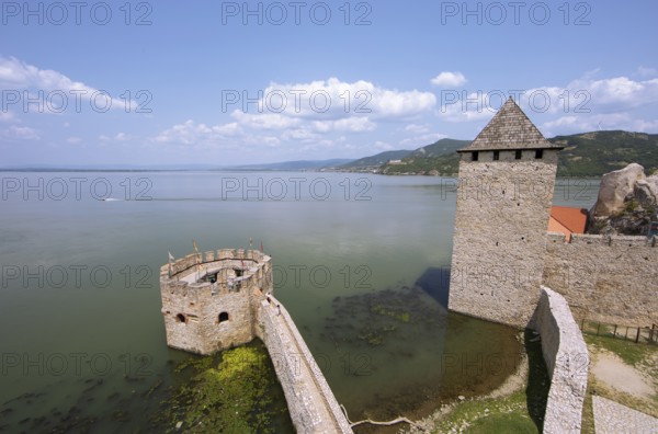Golubac Fortress or Kolumbatz or Pigeon Town or Pigeon Castle on the Danube, in the background the Ðerdap National Park and Romania, Golubac, Serbia