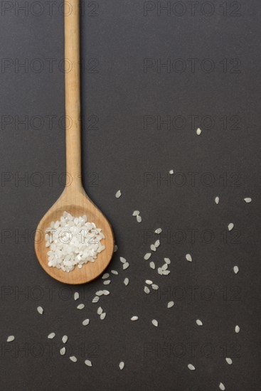 Rice grains in cooking spoons, rice