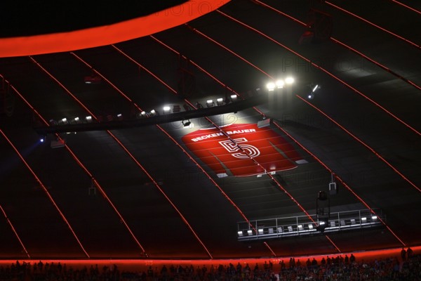 Large-than-life jersey in memory of Emperor Franz Beckenbauer with the back number 5 hangs in the grandstand roof of the Südkurve, 125th anniversary of FC Bayern Munich FCB, Strahlkraft, Allianz Arena, Munich, Bayern, Germany