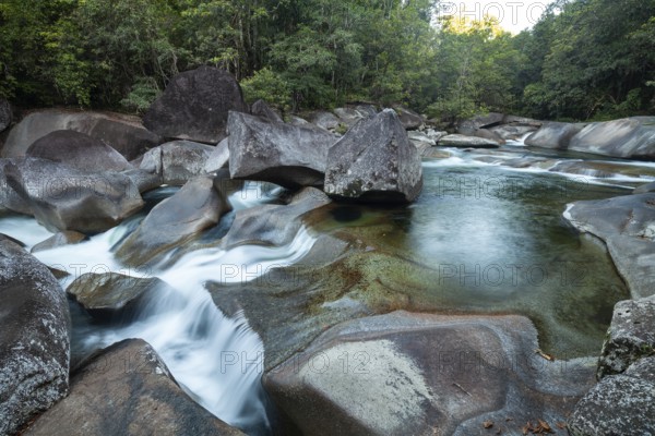 Turquoise blue water between rocks in the tropical rainforest of Babinda Boulders Queensland Australia