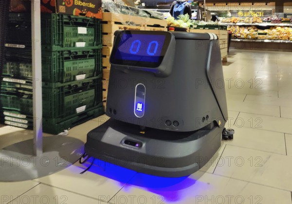 Cleaning robot in supermarket, Witten, North Rhine-Westphalia, Germany