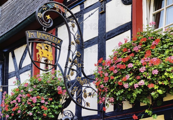 Half-timbered house with nose sign in the old town of Unkel, Rotweinstadt, Neuwied district, Rhineland-Palatinate, Lower Middle Rhine, Rhineland, Germany