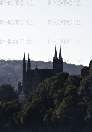 Pilgrimage Church of St. Apollinaris, also Apollinaris Church on Apollinarisberg in Remagen looking back as a silhouette, Rhineland-Palatinate, Germany