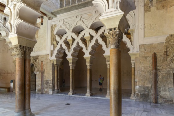 Ornate Islamic design of decorated Moorish arches, Aljafería Palace, Zaragoza, Aragon, Spain