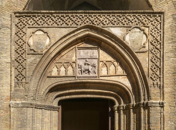 Stonework design historic arched door, Aljafería Palace, Zaragoza, Aragon, Spain, Europe - doorway entrance Chapel of San Martín